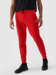 4F Spodnie dresowe joggery męskie - czerwone L. Czerwone joggery i bojówki 4F, na co dzień, l, bez wzorów, z bawełny, sportowe. Za 149.99 zł.