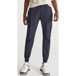 Spodnie jogger - Granatowy. Joggery i bojówki Reserved. W wyprzedaży za 79.99 zł.