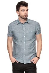 KOSZULA MĘSKA KRÓTKI RĘKAW WRANGLER S/S 1PKT SHIRT OCEAN TEAL W5916LPDP. Niebieskie koszule Wrangler, m, bez wzorów, z materiału, bez kołnierzyka, bez ramiączek. W wyprzedaży za 59.99 zł.