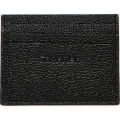 Calvin Klein - Portfel skórzany. Czarne portfele CALVIN KLEIN, bez wzorów, z materiału. W wyprzedaży za 129.90 zł.