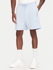 Tommy Jeans Szorty sportowe Entry GraphicDM0DM21369 Błękitny Regular Fit. Niebieskie krótkie spodenki sportowe Tommy Jeans, m, bez wzorów, z bawełny. Za 199.99 zł.