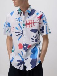 Wzorzysta koszula regular fit - wielobarwny. Koszule Reserved, l, bez wzorów, z tkaniny, bez kołnierzyka, bez ramiączek. W wyprzedaży za 39.99 zł.