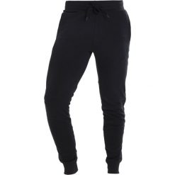 Under Armour THREADBORNE TERRY JOGGER Spodnie treningowe black. Joggery i bojówki marki Under Armour. W wyprzedaży za 269.10 zł.