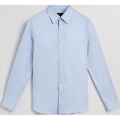 Koszula regular fit - Niebieski. Koszule marki Under Armour. Za 139.99 zł.