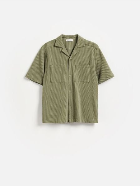 Koszula boxy fit z krótkim rękawem - jasnozielony. Zielone koszule Reserved, l, bez wzorów, z bawełny, bez kołnierzyka, bez ramiączek. Za 119.99 zł.