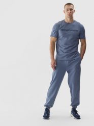 4F Spodnie dresowe joggery męskie - niebieskie M. Niebieskie joggery i bojówki 4F, na co dzień, m, bez wzorów, z bawełny, sportowe. W wyprzedaży za 79.99 zł.