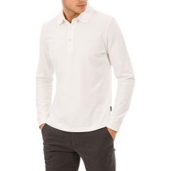 Koszulka polo w kolorze białym. Bezrękawniki marki Galvanni. W wyprzedaży za 164.95 zł.