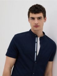 Koszula super slim fit ze stójką - granatowy. Niebieskie koszule Reserved, l, bez wzorów, z bawełny, bez kołnierzyka, bez ramiączek. Za 79.99 zł.