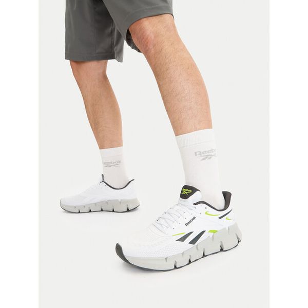 Buty do biegania Reebok. Białe buty do biegania Reebok, bez wzorów, bez zapięcia, do biegania. Za 329.99 zł.