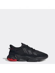 Adidas Sneakersy "Ozweego" w kolorze czarnym rozmiar: 48. Czarne buty treningowe Adidas, bez wzorów, z materiału. Za 256.70 zł.