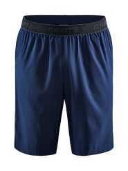 Craft Szorty sportowe "Core Essence" w kolorze granatowym rozmiar: L. Niebieskie krótkie spodenki sportowe Craft, l, bez wzorów, z materiału. Za 88.02 zł.