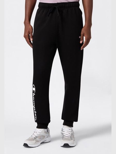 Champion Spodnie dresowe w kolorze czarnym rozmiar: M. Czarne spodnie treningowe długie Champion, m, bez wzorów, z bawełny. Za 135.49 zł.