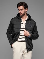 Kurtka lekka męska z łączonych materiałów z kapturem i ozdobnym pikowaniem – czarna V5 OM-JANP-0160 - XXL. Czarne kurtki Ombre Clothing, l, z aplikacjami, z gumy, z kapturem. W wyprzedaży za 139.99 zł.