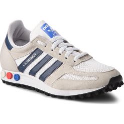 Buty adidas - La Trainer B37829 Crywht/Conavy/Cbrown. Brązowe buty sportowe casual marki Adidas, z materiału. W wyprzedaży za 279.00 zł.