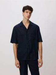 Koszula comfort fit z lyocellu - granatowy. Niebieskie koszule Reserved, l, bez wzorów, z lyocellu, bez kołnierzyka, bez ramiączek. Za 129.99 zł.
