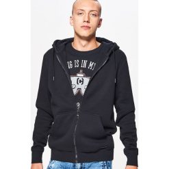 Zapinana bluza BASIC z kapturem - Czarny. Bluzy z kapturem marki DOMYOS. Za 89.99 zł.