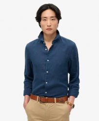 Superdry Koszula lniana Vacation z długim rękawem – NAVY. Niebieskie koszule Superdry, na lato, xl, bez wzorów, ze lnu, bez kołnierzyka, bez ramiączek. Za 317.00 zł.