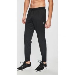 Reebok - Spodnie. Spodnie treningowe długie marki Reebok. Za 169.90 zł.