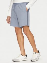 Calvin Klein Jeans Szorty sportowe J30J327246 Niebieski Relaxed Fit. Niebieskie krótkie spodenki sportowe Calvin Klein Jeans, m, bez wzorów, z bawełny. Za 249.99 zł.