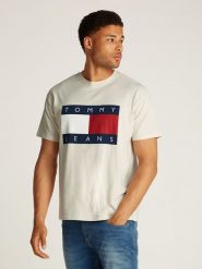 TOMMY JEANS Koszulka w kolorze kremowym rozmiar: XL. Brązowe bezrękawniki Tommy Jeans, xl, bez wzorów, z bawełny, bez kołnierzyka, bez ramiączek. Za 181.33 zł.