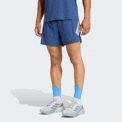Szorty adi365 FORMOTION 2in1. Niebieskie szorty Adidas, bez wzorów, sportowe. Za 199.00 zł.