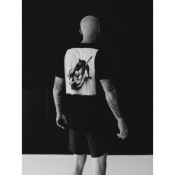 Koszulka sportowa MANTO Motion z krótkim rękawem. Białe t-shirty sportowe Manto, bez wzorów, bez ramiączek. Za 94.99 zł.
