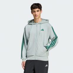 Bluza z kapturem Essentials 3-Stripes French Terry Full-Zip. Zielone bluzy z kapturem Adidas, bez wzorów, z materiału, z kapturem. Za 279.00 zł.