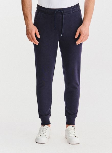 PAKO LORENTE – Granatowe spodnie dresowe. Spodnie materiałowe Pako Lorente, na co dzień, xl, bez wzorów, z bawełny. Za 99.99 zł.