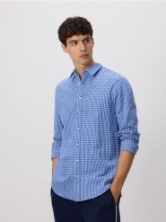 Koszula regular fit z domieszką lnu - niebieski. Niebieskie koszule Reserved, l, bez wzorów, z bawełny, bez kołnierzyka, bez ramiączek. Za 129.99 zł.