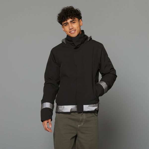 Ciepła kurtka przeciwdeszczowa na rower miejski męska Btwin 540 odblaskowa. Brązowe kurtki B'TWIN, m, bez wzorów, z tworzywa sztucznego, bez kaptura. Za 419.99 zł.