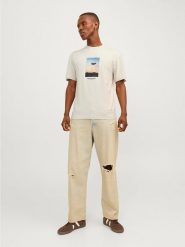 Jack & Jones Koszulka w kolorze kremowym rozmiar: S. Brązowe bezrękawniki Jack & Jones, s, bez wzorów, z bawełny, bez kołnierzyka, bez ramiączek. Za 37.38 zł.