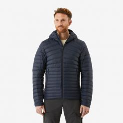 Kurtka puchowa turystyczna męska Forclaz MT100 -5°C. Niebieskie kurtki FORCLAZ, l, bez wzorów, z materiału, trekkingowe. Za 299.99 zł.