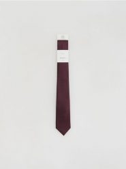 Jedwabny krawat - bordowy. Czerwone krawaty i muchy Reserved, bez wzorów, z jedwabiu. Za 119.99 zł.