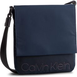 Saszetka CALVIN KLEIN - Shadow Reporter W Flap K50K504398 067. Saszetki i nerki marki CALVIN KLEIN. Za 299.00 zł.