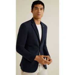 Mango Man - Marynarka Jersey. Niebieskie garnitury Mango Man, na co dzień, bez wzorów, z bawełny. W wyprzedaży za 89.90 zł.