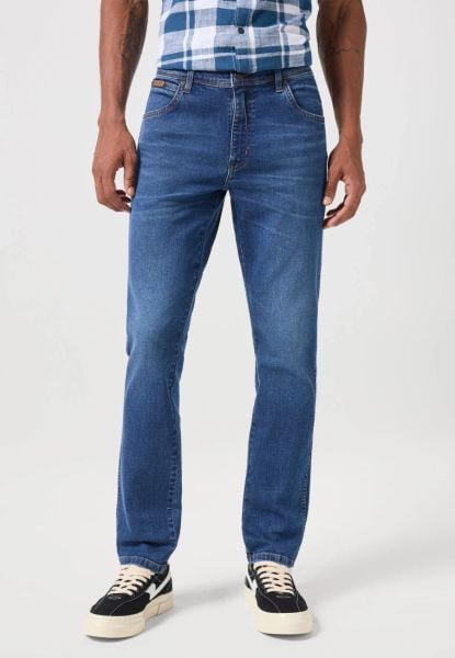 WRANGLER TEXAS SLIM MĘSKIE SPODNIE JEANSOWE JEANS DŻINSY HARVEY BLUE 112350817 W12S017973. Niebieskie jeansy Wrangler, l. Za 229.99 zł.