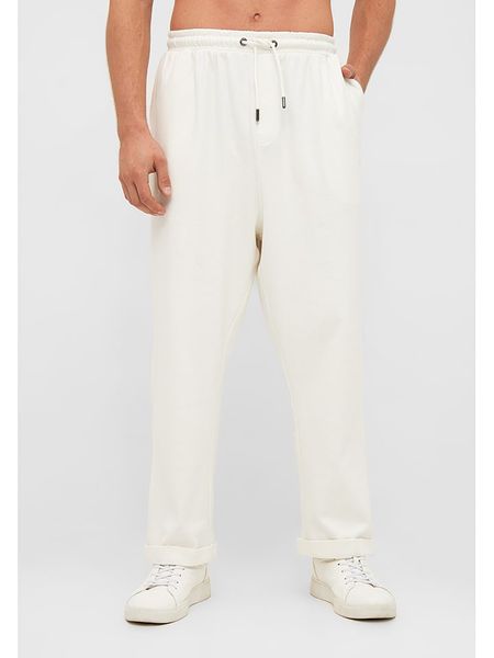 Bench Spodnie dresowe "Jessie" w kolorze białym rozmiar: 52. Białe spodnie treningowe długie Bench, bez wzorów, z dresówki. Za 118.84 zł.
