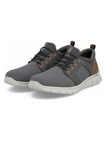 Rieker Sneakersy w kolorze szarym rozmiar: 41. Szare buty sportowe casual Rieker, bez wzorów, bez zapięcia. Za 197.17 zł.