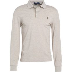 Polo Ralph Lauren SLIM FIT Koszulka polo expedition dune. Koszulki polo Polo Ralph Lauren. W wyprzedaży za 356.30 zł.
