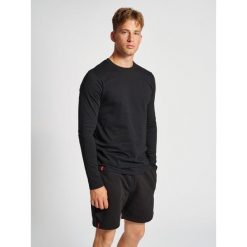 Koszulka fitness męska Hummel Red Heavy z długim rękawem. Czarne bluzki z długim rękawem Hummel, l, bez wzorów, bez kołnierzyka, bez ramiączek. Za 124.50 zł.