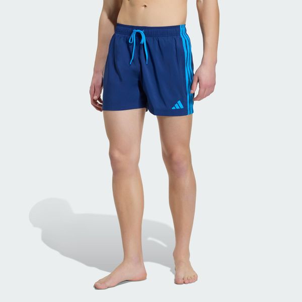 Szorty do pływania 3-Stripes. Niebieskie krótkie spodenki sportowe Adidas, l, bez wzorów, z materiału. Za 149.00 zł.