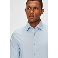 G-Star Raw - Koszula. Niebieskie koszule G-Star Raw, m, bez wzorów, z bawełny, bez kołnierzyka, bez ramiączek. W wyprzedaży za 199.90 zł.