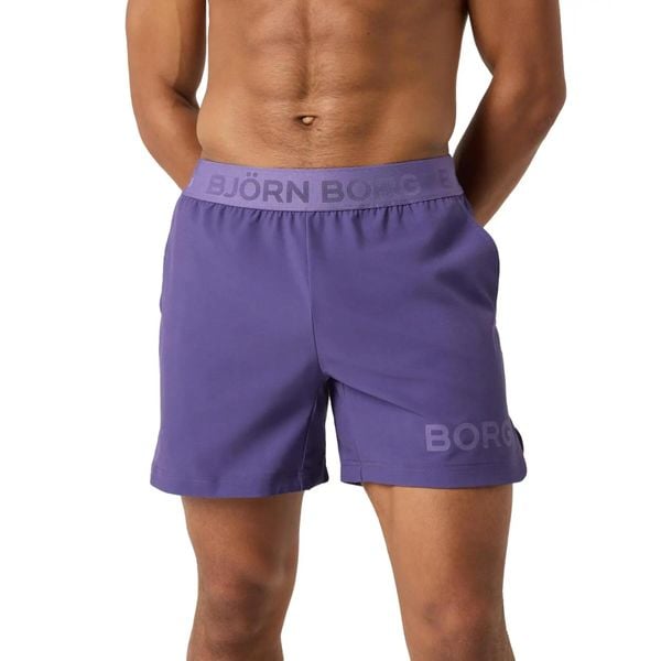 Szorty Björn Borg 6". Fioletowe krótkie spodenki sportowe Björn Borg, l, bez wzorów, ze skóry. Za 270.50 zł.