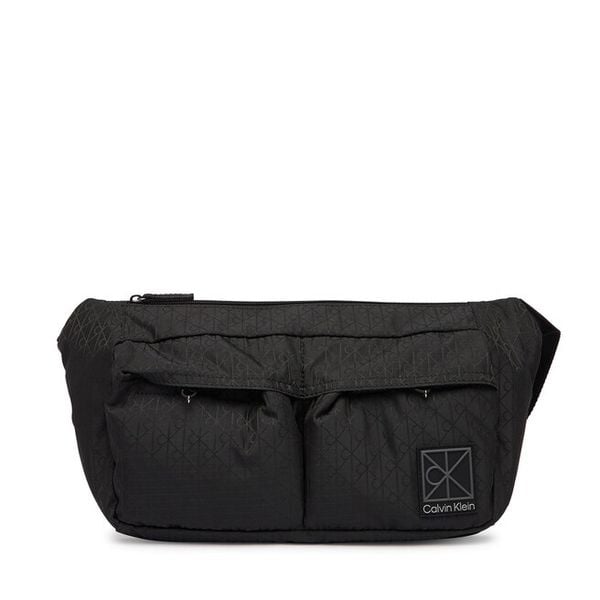 Nerka Calvin Klein. Czarne saszetki i nerki CALVIN KLEIN, bez wzorów. Za 409.99 zł.