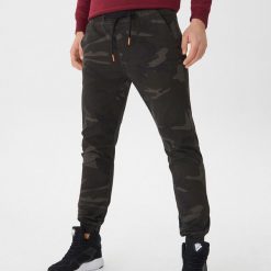 Spodnie typu jogger - Wielobarwn. Joggery i bojówki marki House. Za 99.99 zł.