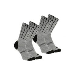 Skarpety turystyczne SH100 warm mid. Skarpety marki QUECHUA. Za 29.99 zł.