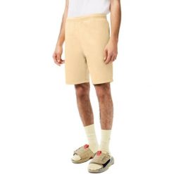 Spodenki męskie Lacoste. Żółte krótkie spodenki sportowe LACOSTE, m, bez wzorów, z bawełny. Za 197.00 zł.