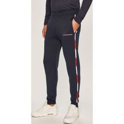 Tommy Sport - Spodnie. Niebieskie spodnie materiałowe Tommy Sport, l, bez wzorów, z dzianiny. Za 399.90 zł.