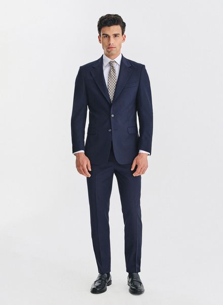 PAKO LORENTE - Wełniany granatowy garnitur męski. Niebieskie garnitury Pako Lorente, do pracy, m, bez wzorów, z wełny. Za 2,499.98 zł.