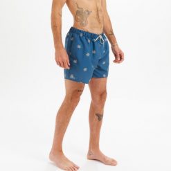 Spodenki surfingowe męskie Olaian 100 Cycas 15". Niebieskie odzież kąpielowa OLAIAN, l, bez wzorów, z materiału, sportowe. Za 49.99 zł.